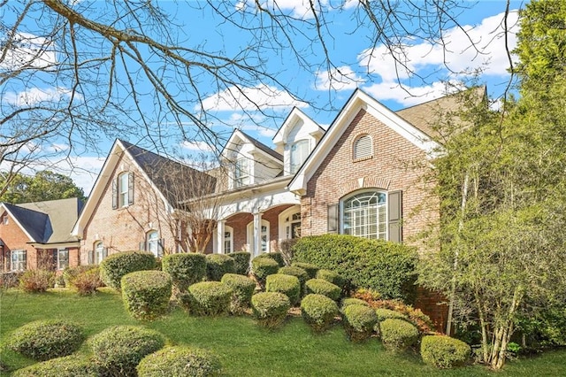 view of front of house with a front yard