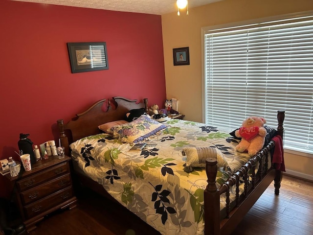 2256 Hansford Pass, Buford, GA 30519 - bedroom featuring hardwood / wood-style floors and baseboards