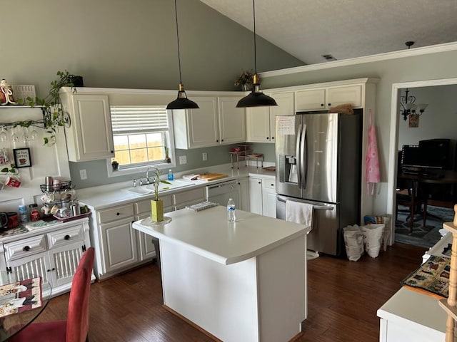 2256 Hansford Pass, Buford, GA 30519 - kitchen featuring stainless steel fridge, a sink, light countertops, white cabinets, and vaulted ceiling