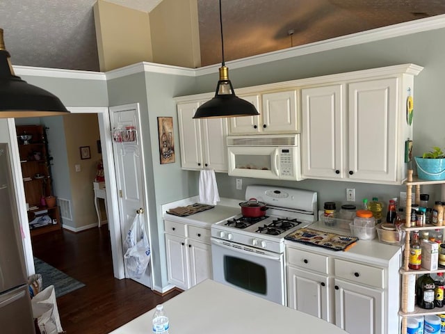 2256 Hansford Pass, Buford, GA 30519 - kitchen with white appliances, dark wood-type flooring, light countertops, and white cabinetry