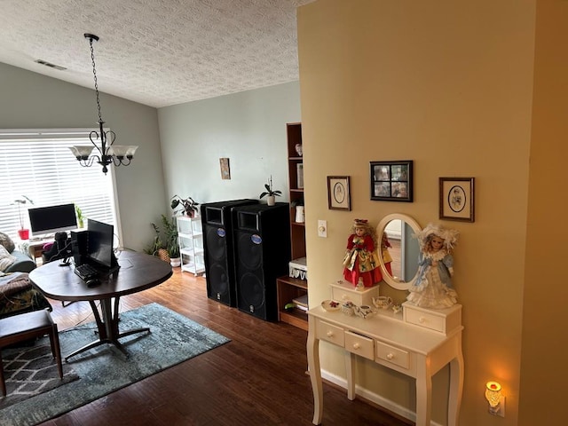 2256 Hansford Pass, Buford, GA 30519 - office space featuring a chandelier, a textured ceiling, vaulted ceiling, and wood finished floors