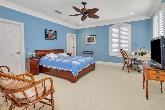 carpeted bedroom with crown molding and ceiling fan