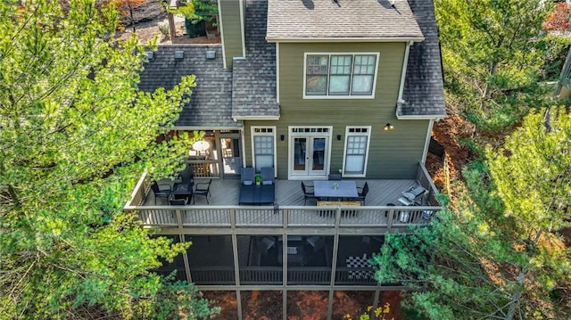 rear view of property with a deck