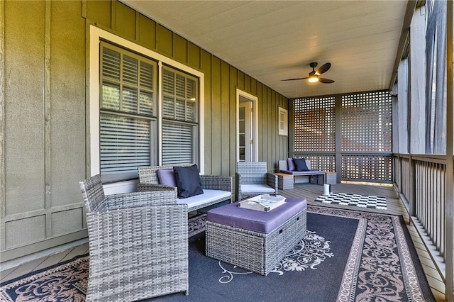 sunroom / solarium with ceiling fan and wooden ceiling