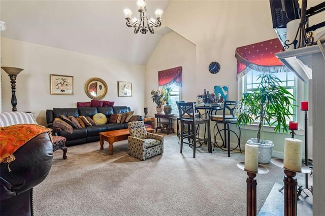 carpeted living room with plenty of natural light, a chandelier, and high vaulted ceiling