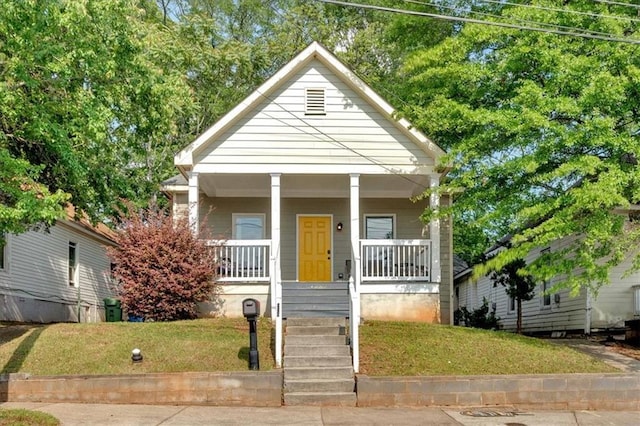898 Allene Ave SW, Atlanta, GA 30310 - bungalow featuring covered porch and a front yard