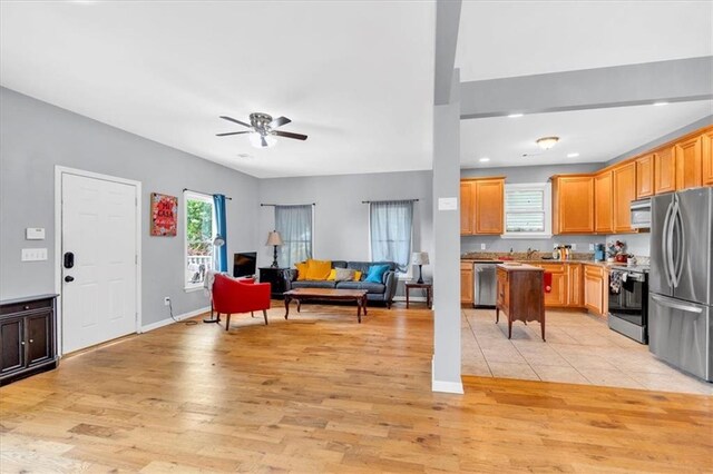 898 Allene Ave SW, Atlanta, GA 30310 - living room with plenty of natural light, a ceiling fan, light wood-style flooring, and visible vents