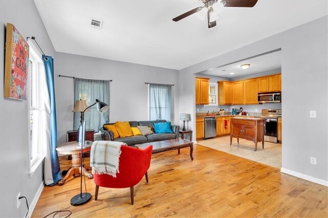 898 Allene Ave SW, Atlanta, GA 30310 - living room featuring a healthy amount of sunlight, light wood finished floors, and visible vents