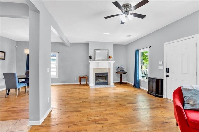 898 Allene Ave SW, Atlanta, GA 30310 - living room with visible vents, light wood finished floors, and ceiling fan with notable chandelier