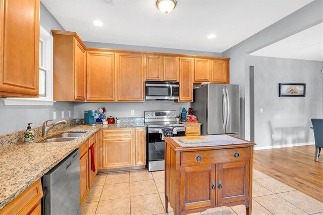 898 Allene Ave SW, Atlanta, GA 30310 - dining space featuring visible vents, a fireplace with flush hearth, light wood-type flooring, baseboards, and a chandelier