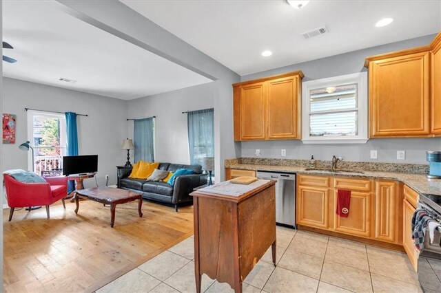 898 Allene Ave SW, Atlanta, GA 30310 - living room with a ceiling fan, light wood-style flooring, and visible vents