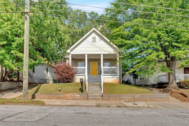 898 Allene Ave SW, Atlanta, GA 30310 - view of front of home with covered porch, stairs, and a front lawn