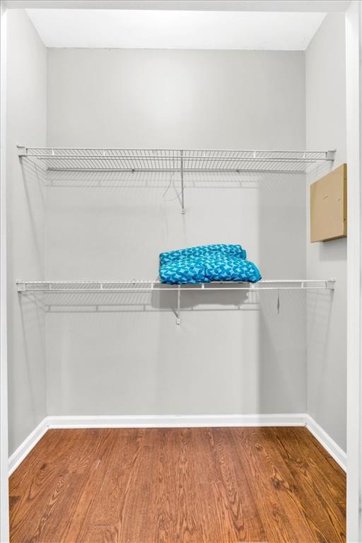 898 Allene Ave SW, Atlanta, GA 30310 - bathroom with tile patterned flooring, baseboards, vanity, toilet, and shower / bath combo with shower curtain