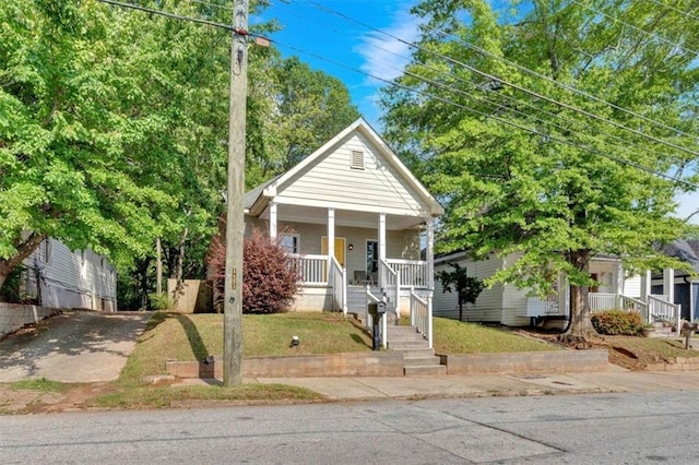 898 Allene Ave SW, Atlanta, GA 30310 - view of front facade with stairs, covered porch, and a front yard