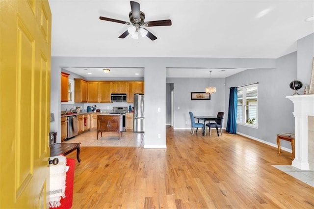 898 Allene Ave SW, Atlanta, GA 30310 - living area with visible vents, a fireplace, baseboards, recessed lighting, and light wood-style flooring