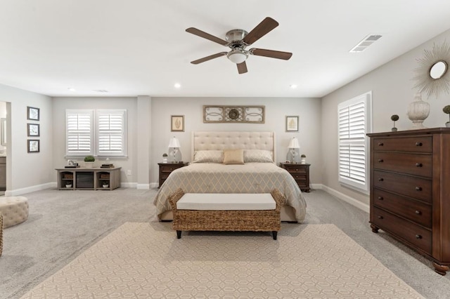 bedroom featuring light colored carpet, baseboards, a ceiling fan, and recessed lighting