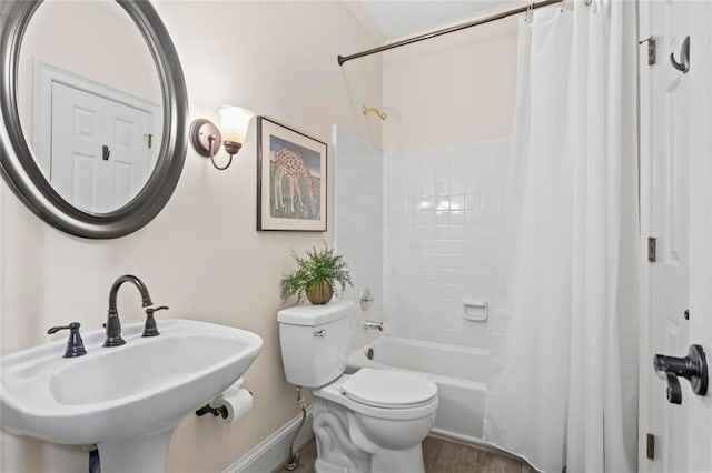 121 Clipper Bay Dr, Alpharetta, GA 30005 - bathroom featuring shower / tub combo and wood finished floors