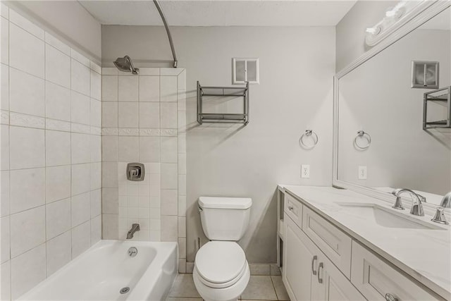 bathroom with visible vents, shower / bathing tub combination, toilet, vanity, and tile patterned floors