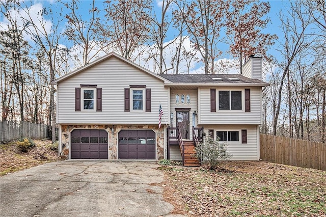 bi-level home featuring a garage