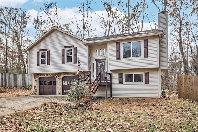 split foyer home featuring a garage