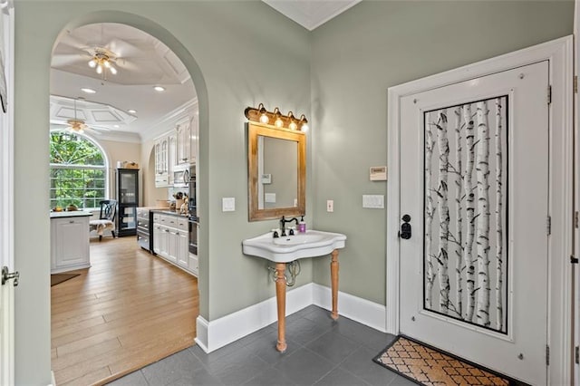 4337 Mountain View Rd, Oakwood, GA 30566 - foyer entrance with ceiling fan, crown molding, arched walkways, and recessed lighting