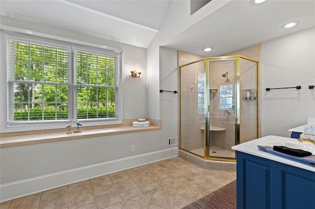 4337 Mountain View Rd, Oakwood, GA 30566 - full bath featuring vaulted ceiling, a shower stall, tile patterned flooring, and recessed lighting