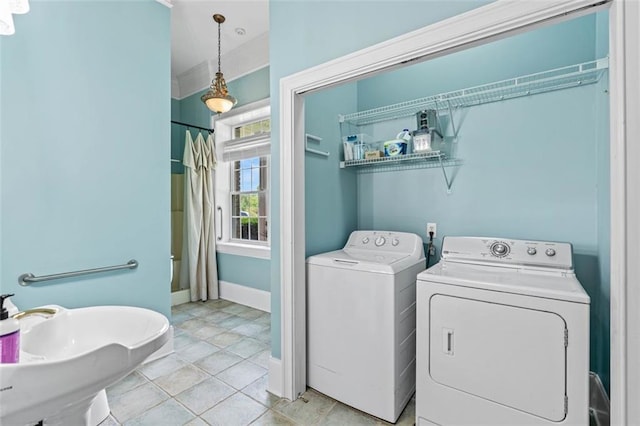 4337 Mountain View Rd, Oakwood, GA 30566 - washroom with washer and clothes dryer and baseboards