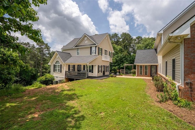 4337 Mountain View Rd, Oakwood, GA 30566 - rear view of property featuring a yard