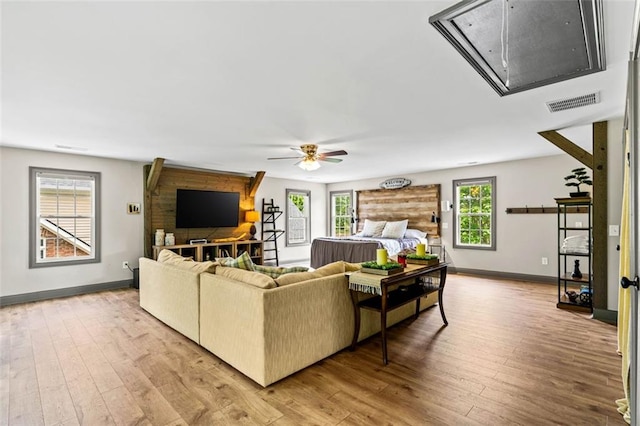4337 Mountain View Rd, Oakwood, GA 30566 - living area featuring attic access, a ceiling fan, and light wood-type flooring