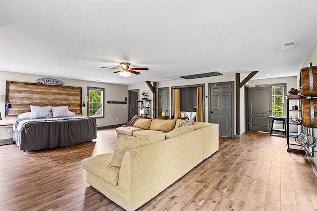 4337 Mountain View Rd, Oakwood, GA 30566 - living area featuring ceiling fan, healthy amount of natural light, and wood finished floors