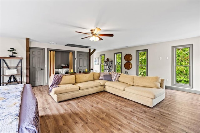 4337 Mountain View Rd, Oakwood, GA 30566 - living room featuring healthy amount of natural light, light wood finished floors, and a ceiling fan
