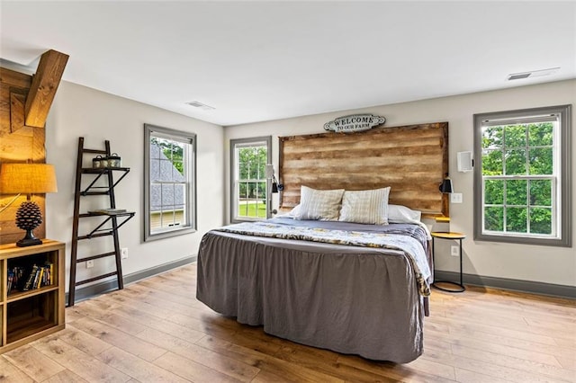 4337 Mountain View Rd, Oakwood, GA 30566 - bedroom with wood-type flooring and multiple windows