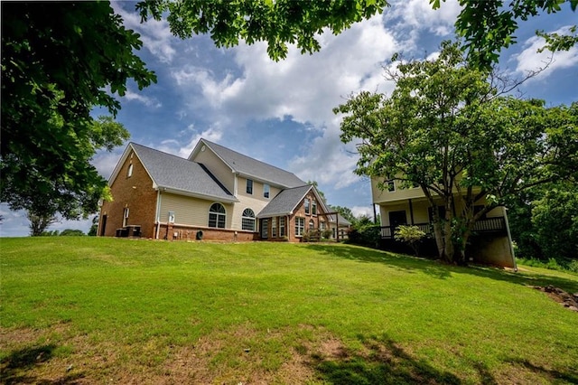 4337 Mountain View Rd, Oakwood, GA 30566 - back of property featuring a yard and brick siding