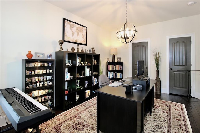 office space featuring dark hardwood / wood-style floors and a notable chandelier