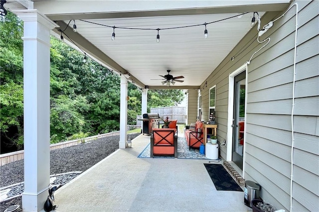 view of patio with ceiling fan and area for grilling