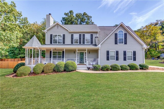 view of front of home featuring covered porch