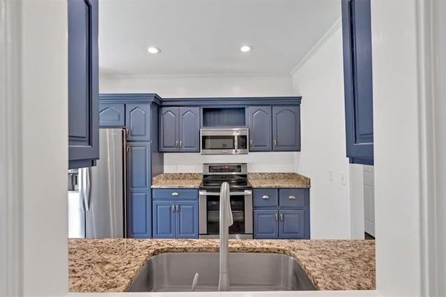 kitchen featuring appliances with stainless steel finishes, ornamental molding, blue cabinetry, and light stone counters
