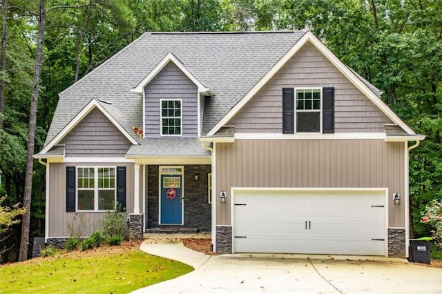 craftsman-style home with a garage