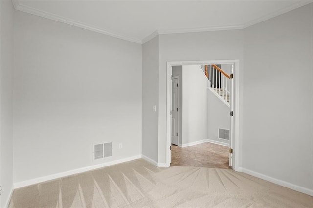 194 Lake Ruby Dr, Suwanee, GA 30024 - empty room featuring crown molding, carpet floors, baseboards, and stairway