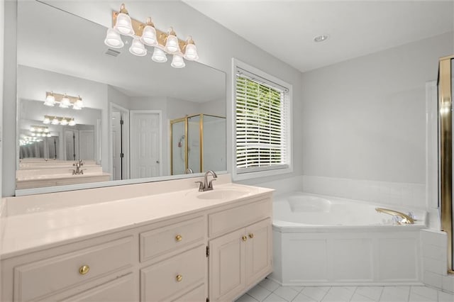 194 Lake Ruby Dr, Suwanee, GA 30024 - full bath featuring a shower stall, a garden tub, vanity, and tile patterned floors