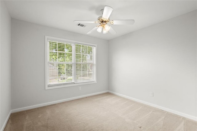194 Lake Ruby Dr, Suwanee, GA 30024 - spare room with carpet flooring, baseboards, and a ceiling fan