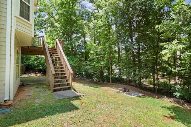 194 Lake Ruby Dr, Suwanee, GA 30024 - view of grassy yard with stairway and a deck