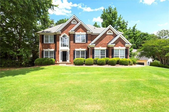 194 Lake Ruby Dr, Suwanee, GA 30024 - view of front of property featuring brick siding and a front yard