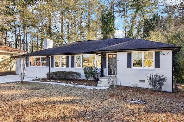 single story home featuring a front yard