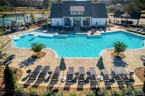 6450 Pond View Dr, Cumming, GA 30028 - community pool featuring a patio area