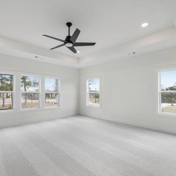 6450 Pond View Dr, Cumming, GA 30028 - empty room with light colored carpet, recessed lighting, a raised ceiling, and a ceiling fan
