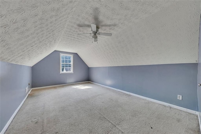 964 Natural Brook Trl, Lawrenceville, GA 30045 - bonus room featuring carpet floors, a ceiling fan, lofted ceiling, and a textured ceiling