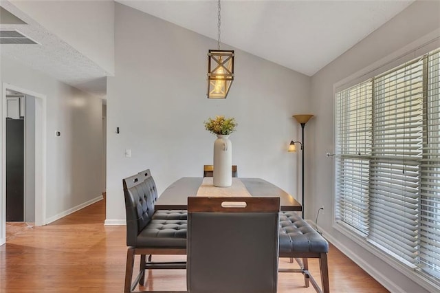 964 Natural Brook Trl, Lawrenceville, GA 30045 - dining area featuring wood finished floors and vaulted ceiling