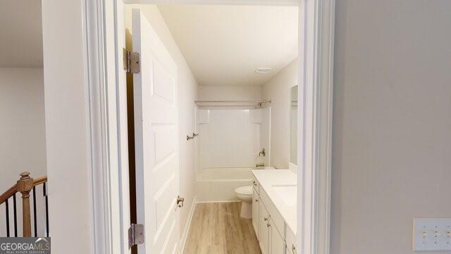 3402 Milan Ct Lot 1Plapprox Sqft 2, Douglasville, GA 30135 - bathroom featuring vanity, wood finished floors, and  shower combination