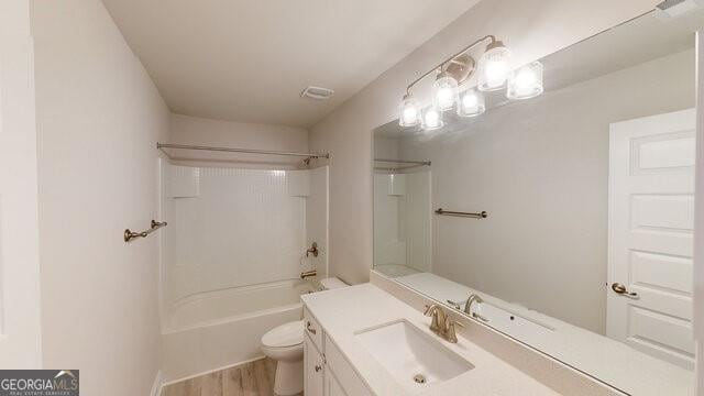 3402 Milan Ct Lot 1Plapprox Sqft 2, Douglasville, GA 30135 - full bath featuring vanity,  shower combination, and wood finished floors